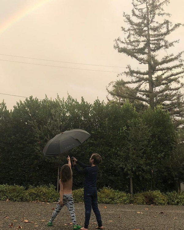 A picture of Axel Lee McElhenney enjoying the view of a rainbow with his younger brother, Leo Grey McElhenney.